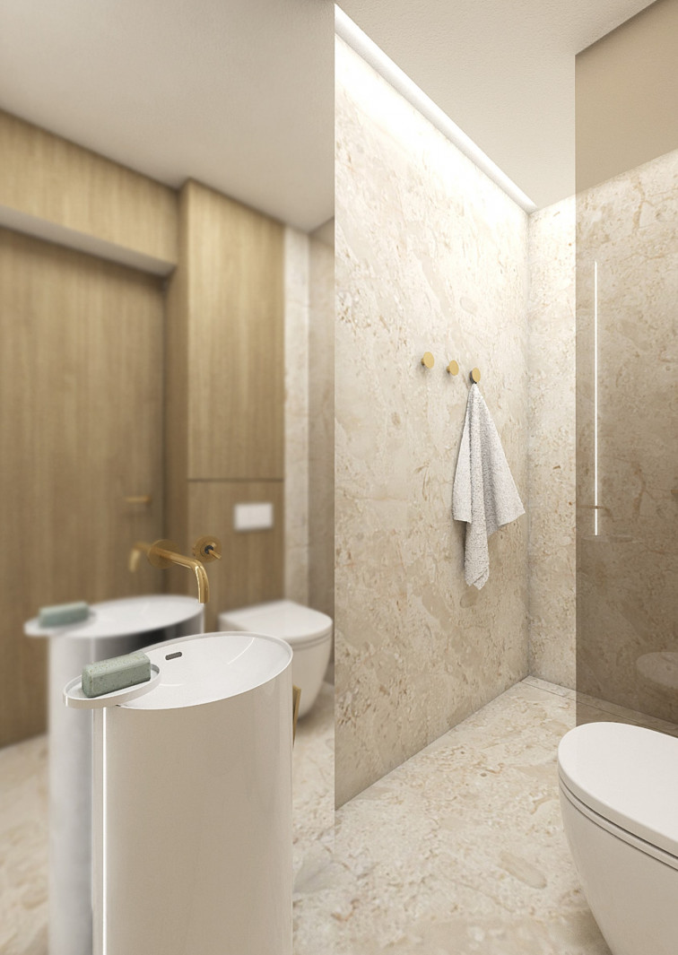 Kúpeľne obkladané prírodným kameňom s výraznými solitérnymi sanitárnymi prvkami.